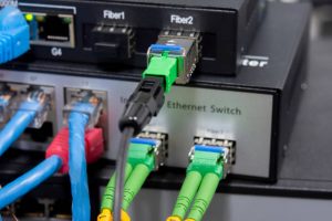 Fiber Optic cables and UTP Network cables stock photo. Optical Fiber communication Distribution point.