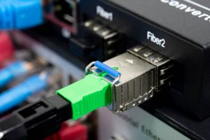 Fiber Optic cables and UTP Network cables stock photo. Optical Fiber communication Distribution point.